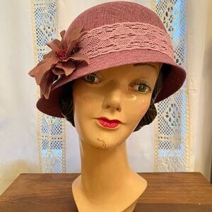 Elegant Purple Cloche Hat with Floral Accent
